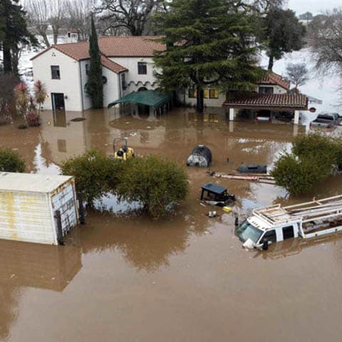 Western states face powerful atmospheric river, potential bomb cyclone